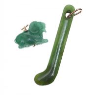 TWO JADE CHARMS WITH GOLD BALES at Ross's Online Art Auctions