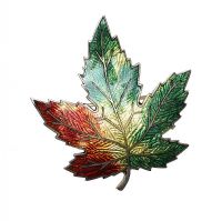 METAL AND ENAMEL CANADIAN MAPLE LEAF BROOCH at Ross's Online Art Auctions