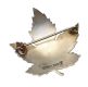 METAL AND ENAMEL CANADIAN MAPLE LEAF BROOCH at Ross's Online Art Auctions