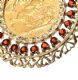 9CT GOLD MOUNTED FULL SOVEREIGN WITH GARNETS at Ross's Online Art Auctions