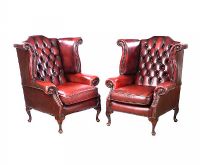 PAIR OF LEATHER WING BACK ARMCHAIRS at Ross's Online Art Auctions