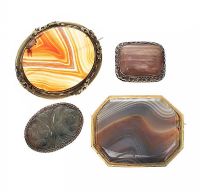 FOUR HARDSTONE-SET BROOCHES at Ross's Online Art Auctions