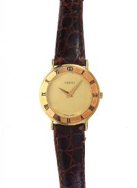 GUCCI GOLD-TONE LADY'S WRIST WATCH at Ross's Online Art Auctions