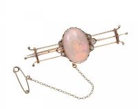 15CT GOLD BAR BROOCH SET WITH OPAL AND DIAMOND at Ross's Online Art Auctions