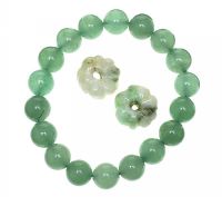 JADE BRACELET WITH TWO JADE CHARMS at Ross's Online Art Auctions