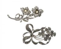 TWO SILVER-TONE COSTUME BROOCHES at Ross's Online Art Auctions