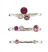 THREE STERLING SILVER PINK SWAROVSKI CRYSTAL RINGS at Ross's Online Art Auctions