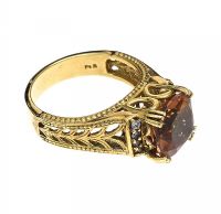 GOLD TONE PURPLE STONE RING at Ross's Online Art Auctions