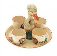 CLARICE CLIFF HAND PAINTED HONEY GLAZE EGG CUP HOLDER & EGG CUPS at Ross's Online Art Auctions