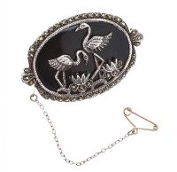 STERLING SILVER MARCASITE AND ONYX BROOCH at Ross's Online Art Auctions