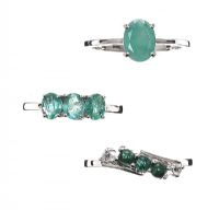 THREE STERLING SILVER RINGS WITH GREEN GEMSTONES at Ross's Online Art Auctions