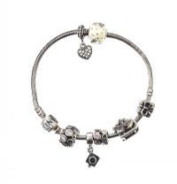 PANDORA STERLING SILVER BRACELET WITH CHARMS OF A CHRISTMAS THEME at Ross's Online Art Auctions
