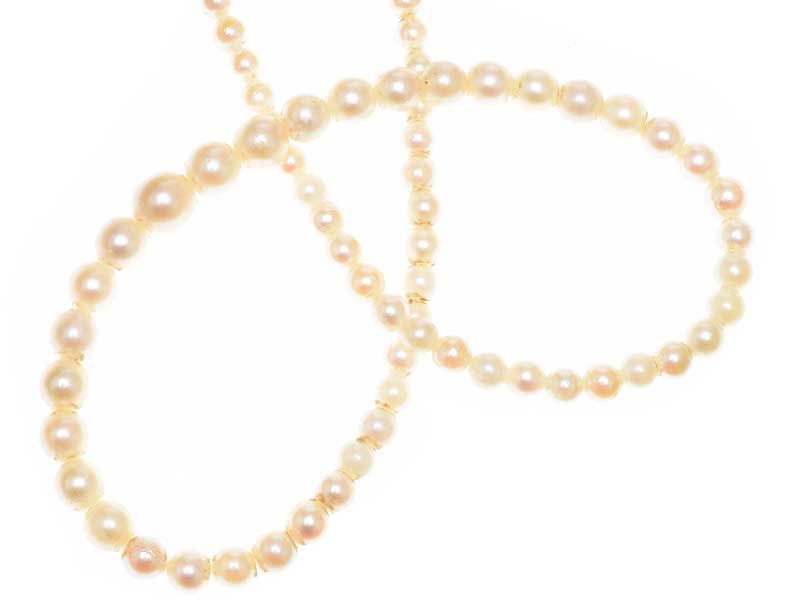 GRADUATED STRAND OF CULTURED PEARLS WITH SILVER AND MARCASITE DAISY CLASP at Ross's Online Art Auctions