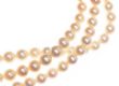 TRIPLE STRAND OF CULTURED PEARLS WITH 9CT GOLD GARNET CLASP at Ross's Online Art Auctions