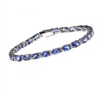 18CT WHITE GOLD TANZANITE AND DIAMOND LINE BRACELET at Ross's Online Art Auctions