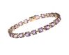 9CT GOLD AMETHYST BRACELET AND GOLD-TONE AMETHYST CROSS ON 9CT GOLD CHAIN at Ross's Online Art Auctions