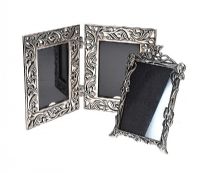 TWO VINTAGE SILVER-TONE PHOTO FRAMES at Ross's Online Art Auctions
