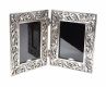 TWO VINTAGE SILVER-TONE PHOTO FRAMES at Ross's Online Art Auctions