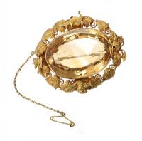 LARGE SOLID GOLD BROOCH SET WITH CITRINE at Ross's Online Art Auctions