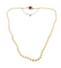 STRAND OF CULTURED PEARLS WITH 9CT GOLD GARNET AND PEARL CLASP at Ross's Online Art Auctions