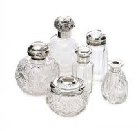 FIVE SLVER TOPPED GLASS BOTTLES AND A HAIR PIN TIDY at Ross's Online Art Auctions