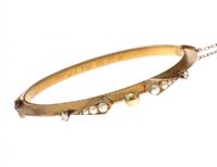 9CT GOLD PEARL AND DIAMOND BANGLE at Ross's Online Art Auctions