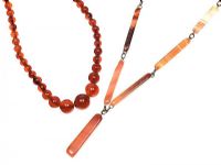 TWO AMBER COLOURED BEADED NECKLACES at Ross's Online Art Auctions