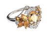 STERLING SILVER RING SET WITH AMBER-COLOURED STONES AND CUBIC ZIRCONIA at Ross's Online Art Auctions