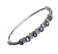 9CT WHITE GOLD SAPPHIRE AND DIAMOND BANGLE at Ross's Online Art Auctions