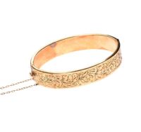 GOLD TONE BANGLE at Ross's Online Art Auctions
