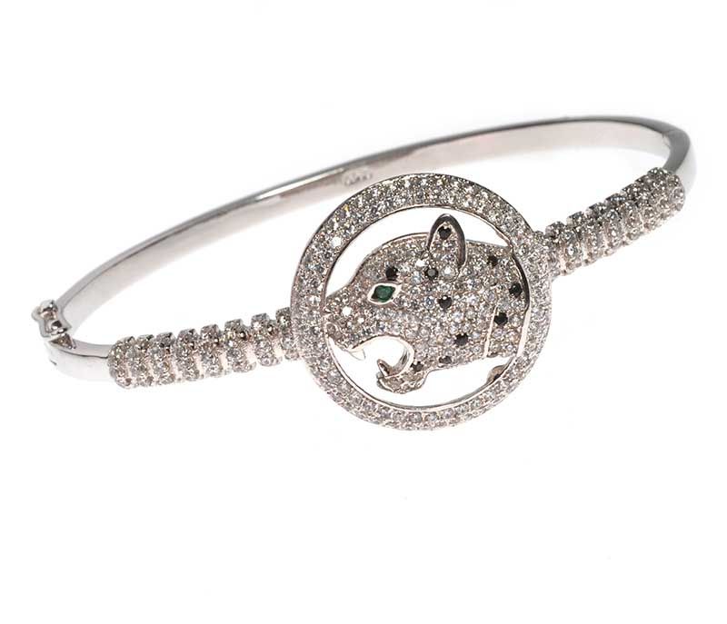 STERLING SILVER AND CUBIC ZIRCONIA PANTHER BANGLE IN THE STYLE OF CARTIER