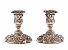 PAIR OF EMBOSSED SILVER CANDLESTICKs at Ross's Online Art Auctions