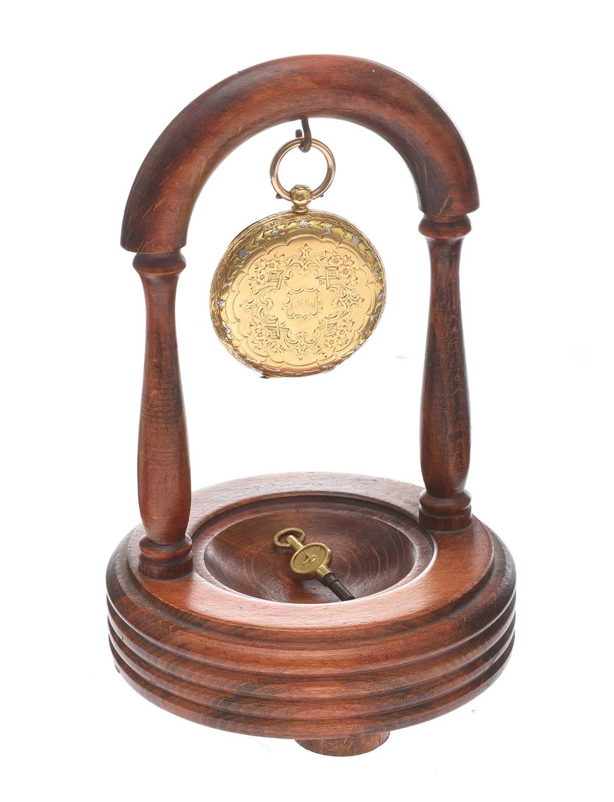 18CT GOLD POCKET WATCH WITH WOODEN STAND at Ross's Online Art Auctions