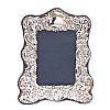 EMBOSSED SILVER PHOTO FRAME at Ross's Online Art Auctions