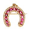 18CT GOLD RUBY & DIAMOND HORSESHOE BROOCH at Ross's Online Art Auctions