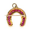 18CT GOLD RUBY & DIAMOND HORSESHOE BROOCH at Ross's Online Art Auctions