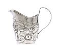EMBOSSED SILVER CREAM JUG at Ross's Online Art Auctions